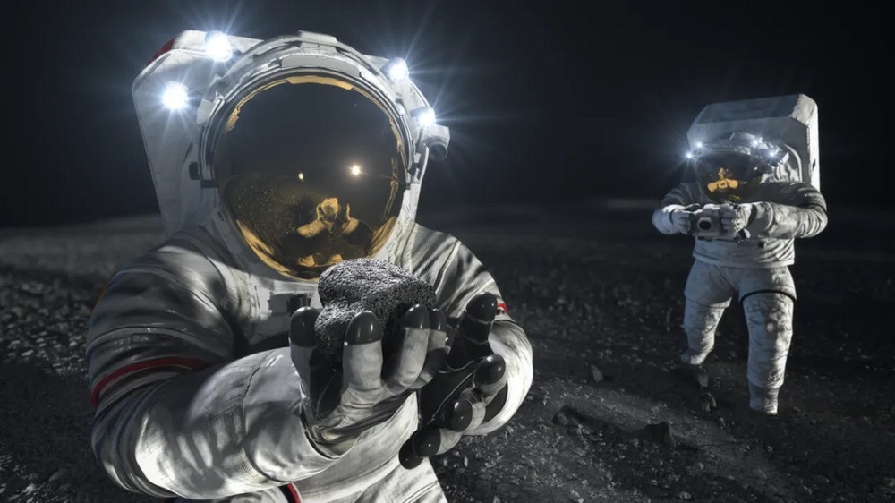 宇宙服を着て月面で作業する2人の飛行士のイラスト。手前の飛行士は岩を拾い上げて調べており、もう1人はこの岩を採集した場所を撮影している（提供：NASA）