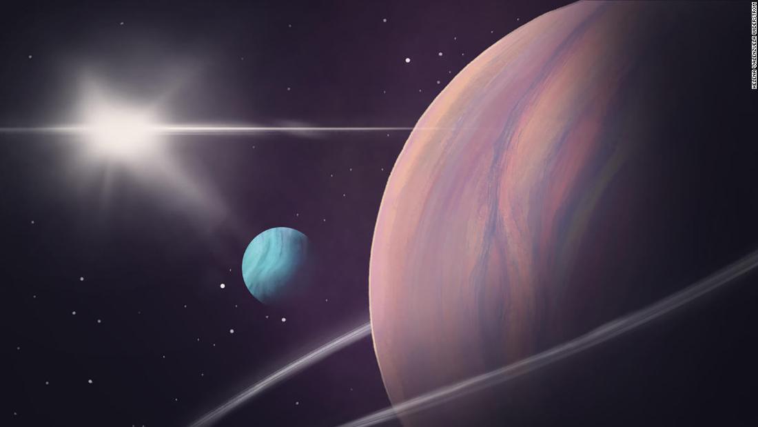 地球から５０００光年以上離れた巨大系外惑星（右）を周回する巨大天体（青色）が発見された
